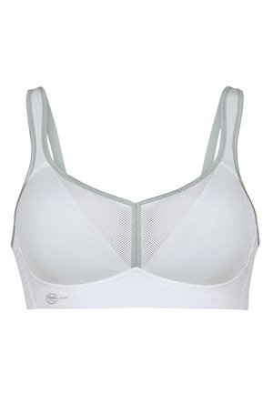 Bra sportivo bianco in rete con accenti verde chiaro, caratterizzato da spalline regolabili e un design traspirante per un maggiore comfort e supporto.