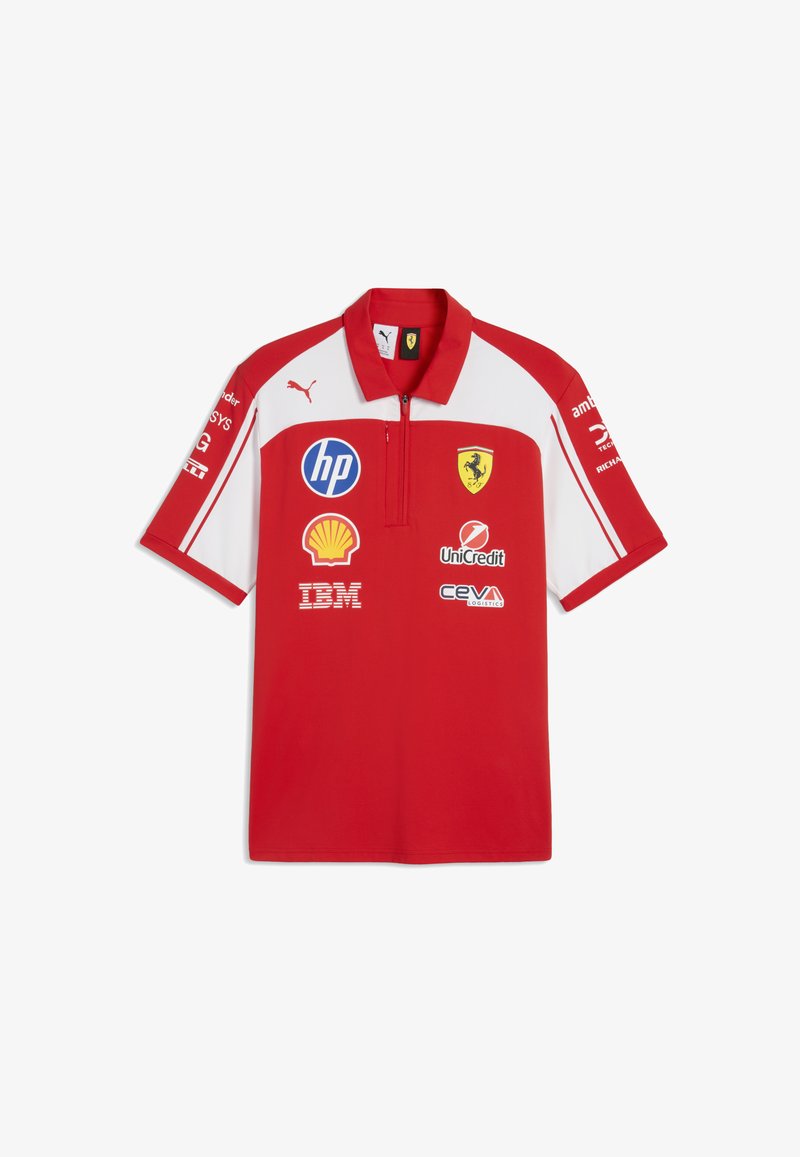 Polo Ferrari rouge et blanc à manches courtes avec col zippé, logo Puma et logos des sponsors incluant HP, Shell, IBM, UniCredit et CEVA.