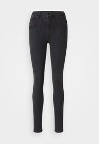 Zwarte high-waist skinny jeans met voorknop en rits, voor- en achterzakken, weergegeven tegen een effen lichte achtergrond.