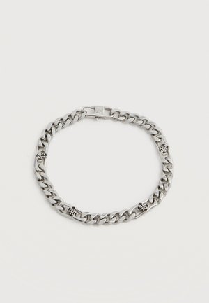 Silver chain bracelet with wide links and four small floral-shaped decorative charms evenly spaced around it.