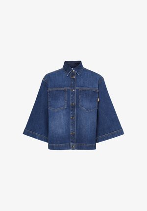 Blue denim button-up shirt with short sleeves, featuring two chest pockets, pointed collar, and contrasting stitching. Smooth texture.