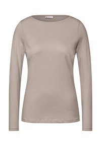 Ljusbeige långärmad tröja i mjukt bomullsblandning. Har en rundad halsringning och rak skärning med fållade kanter. Slät textur.