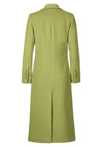 Long green coat made of textured fabric, featuring a notched collar and buttoned cuffs. Back center vent for ease of movement.