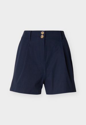 Shorts de talle alto en azul marino con dos botones marrones, trabillas para cinturón, pliegues frontales y una silueta limpia y entallada.