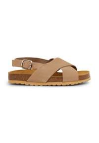 Tan cross-strap sandal with a flat cork sole, adjustable buckle, and textured footbed. Side view highlights the lightweight design.