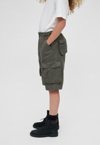 Brandit URBAN LEGEND - Kapsáče - olive