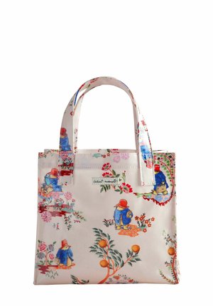 Cremfarbener Einkaufsbeutel mit glänzenden Griffen, der ein florales Muster und ein Muster von Paddington Bear in lebhaften Farben zeigt. Kompakte und strukturierte Gestaltung.
