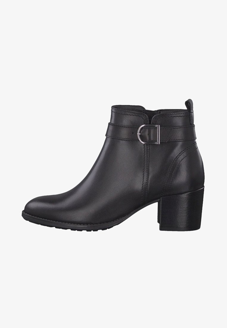 Bottine en cuir noir avec talon bloc moyen, bride à boucle latérale et bout arrondi, vue de côté extérieur.