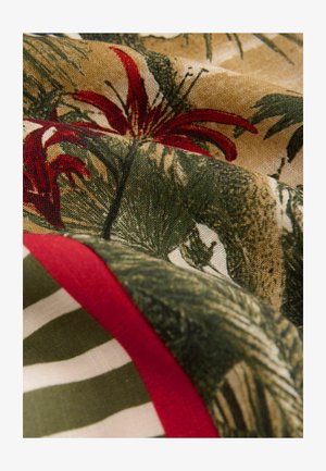 Fabric featuring a tropical pattern with red flowers and green leaves on a tan background, accented by red and green striped edges.