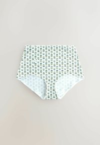 Culotte blanche taille haute pour femmes avec rayures verticales et petit motif floral vert sur un fond clair uni.