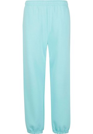 Helles blaues Sweatpants aus weichem Stoff, mit einem elastischen Bund und gerafften Bündchen an den Knöcheln. Einfaches Design, ohne Muster.