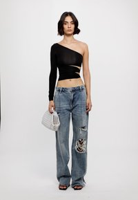 Ksubi LOW RIDER TUCK TROUSERS - Široke nogavice - denim