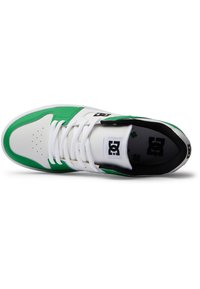 White and green sneaker with a smooth leather upper, perforated toe, flat laces, and a padded black lining. Features a logo on the tongue.