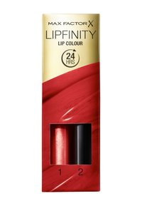 Il packaging del rossetto Max Factor X Lipfinity presenta una parte superiore dorata con un design rosso. Il compartimento interno contiene due tubi: uno rosso e uno nero.