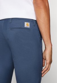 Carhartt WIP SID PANT - Παντελόνι - ore rinsed