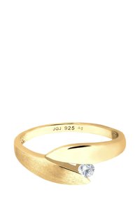 Vergoldeter Ring mit einem schlanken, geschwungenen Design, der einen einzelnen klaren Edelstein in einem strukturierten Band zeigt. Markiert mit "JGJ 925 Ag."