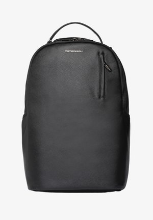 Sac à dos noir texturé avec poignée supérieure, poche avant zippée verticale et logo "MOMODESIGN" sur le panneau avant supérieur.