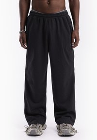 FAVELA DART JOGGER UNISEX - Tracksuit bottoms - black