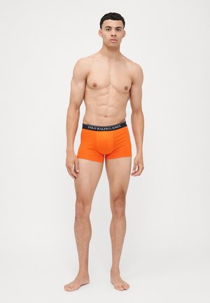 Boxeri din bumbac portocalii cu un brâu elastic negru pe care se află logo-ul "POLO RALPH LAUREN", formă ajustată, textură netedă.