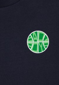 Navy sweatshirt featuring a circular green graphic emblem with the text "SAD BOYS" in a basketball-inspired design. Cotton blend fabric.