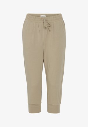 Beige jogger pants made of soft fabric, featuring an elastic waistband with a drawstring, side pockets, and cuffed ankles.