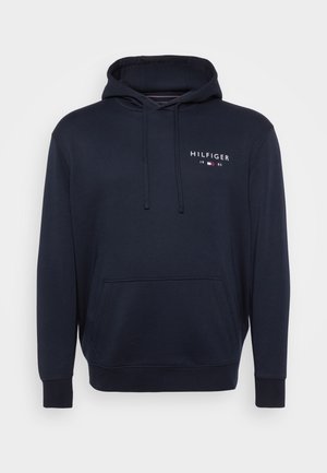 Navy blue hoodie with a front pocket, drawstring hood, and "HILFIGER" logo in white and red accents. Made of soft cotton fabric.