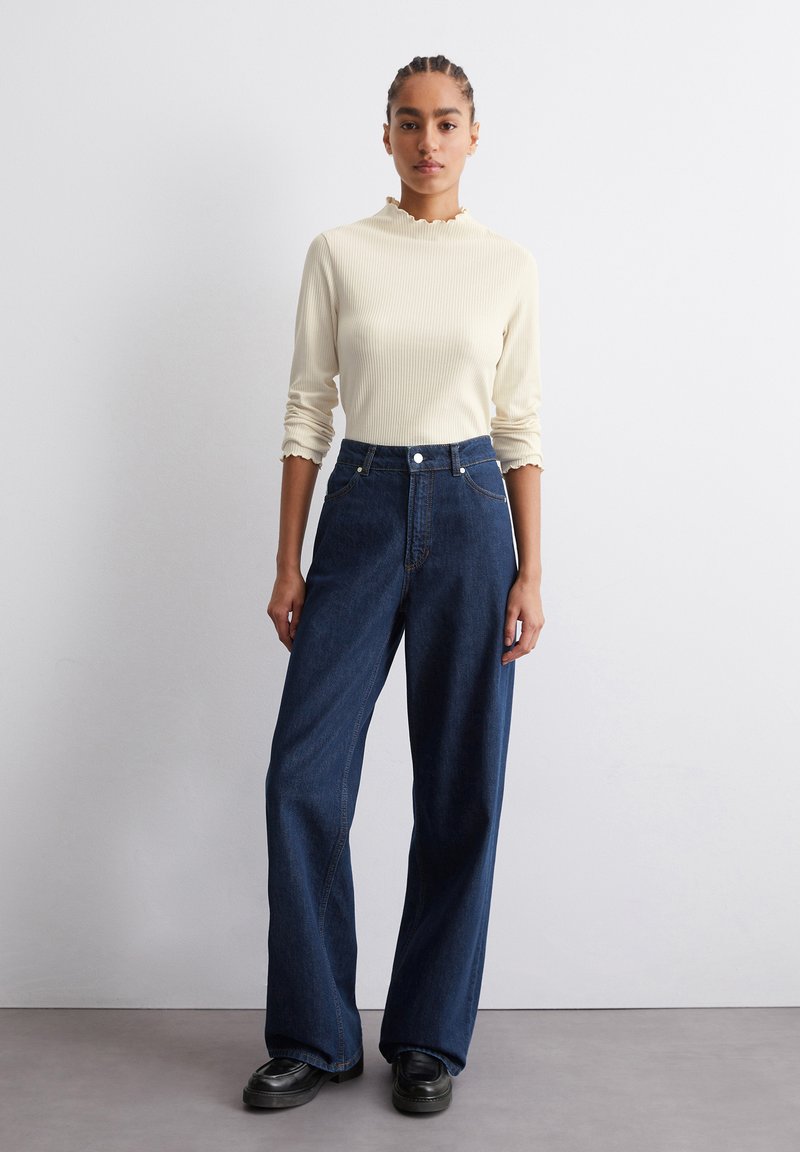 Pantalon cargo femme bleu foncé avec poches multiples - CARGO-SPOT | La mode cargo pour tous