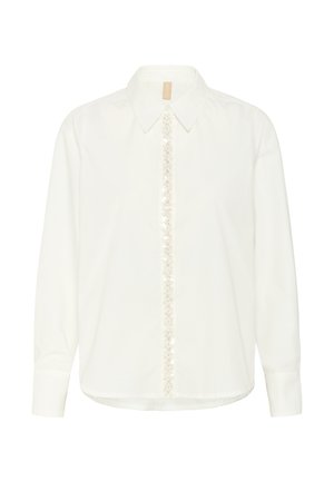 Bílá bavlněná košile s klasickým límečkem, dlouhými rukávy a dekorativním proužkem z flitrů vpředu. Hladká textura, volný střih.
