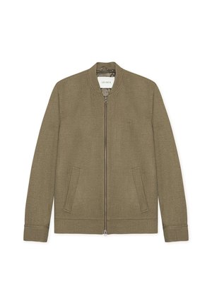 Õlivedroheline bomberjakk tekstuurse kangaga, millel on ees tõmblukk, kaks küljetaskut, soonikkoes varrukasuud ja ümar krae.