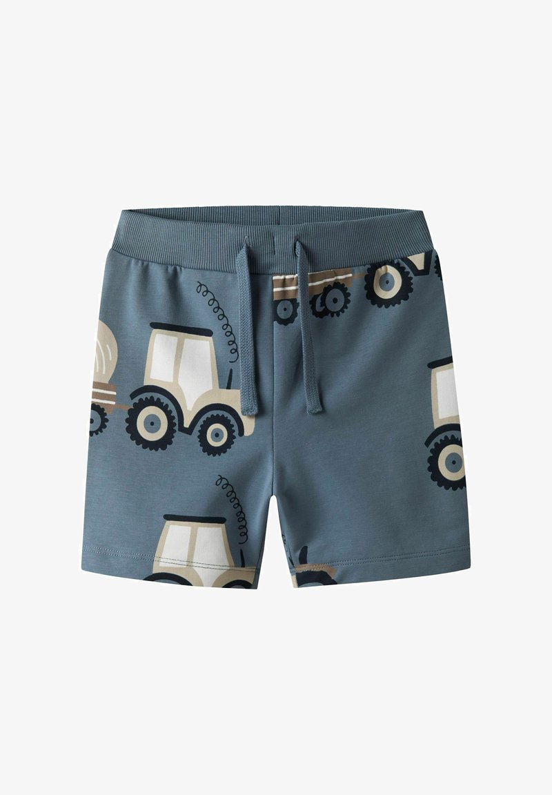 Shorts di cotone blu con un motivo di trattori beige e neri, dotati di una cintura morbida e un cordoncino per una vestibilità regolabile.