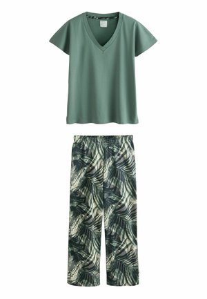 Haut vert clair à col en V avec manches courtes, assorti à un pantalon à jambes larges arborant un motif de feuilles tropicales vert foncé. Texture de tissu lisse.