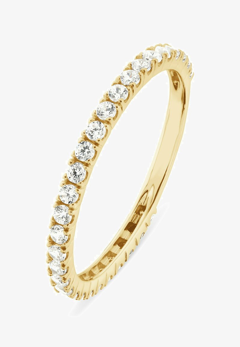 Delicata fascia di eternità in oro impreziosita con una fila continua di diamanti taglio brillante rotondi.