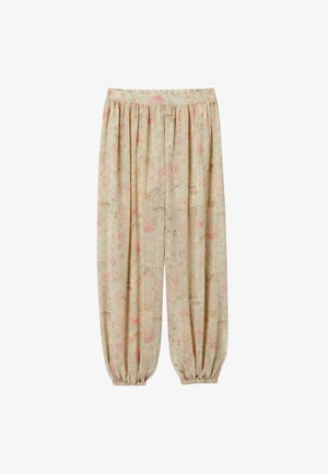Pantalon beige ample avec motif floral rose, taille élastiquée et bas élastiques froncés aux chevilles.