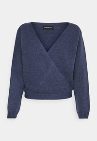 Námořnická modrá obálková svetr s výstřihem do V, dlouhými rukávy a žebrovanými manžetami. Měkká textura a krátký design, označeno štítkem s logem.