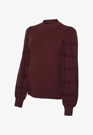 Burgundska pulover s visokim ovratnikom, s pletenim telesom in obsežnimi rokavi. Rokavi imajo vzorčast dizajn in rebraste manšete.