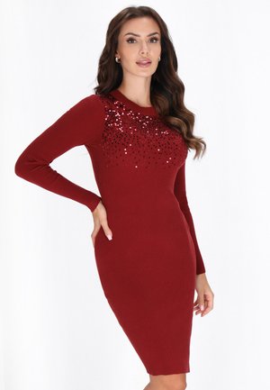 Gestreiftes rotes Strickkleid mit langen Ärmeln und rundem Ausschnitt, verziert mit Pailletten im Oberteil. Figurnah geschnitten, knielanges Design.