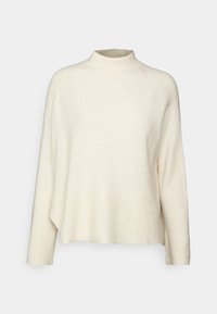 Maglione lavorato a maglia di colore crema con collo alto, orlo a costine e vestibilità leggermente over. Tessuto morbido e maniche lunghe.