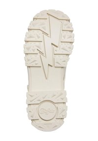 Suela de zapato de goma blanca con un diseño de rayo en contraste, un patrón de banda destacado y detalles de agarre texturizados.