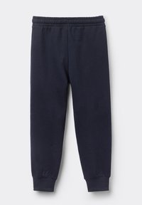 Granatowe dresy z miękkiego materiału, z elastycznym pasem, ściągaczami na kostkach oraz prostym, gładkim wzorem.