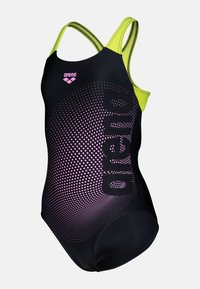 Musta uimapuku, jossa on vaaleanpunainen gradienttipistekuvio, vihreät hihnat ja "arena"-logo. Sisältää klassisen uimapukusuunnittelun optimaalisen mukavuuden takaamiseksi.
