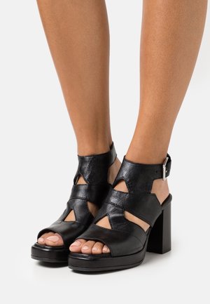 MJUS, Sandales à talons hauts - black