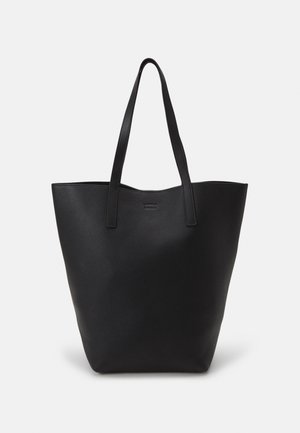 Black leather tote bag with a textured surface, open top, and two long handles. Simple, angular shape without additional embellishments.