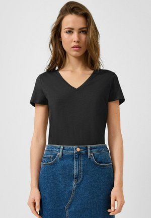 T-shirt basique - schwarz