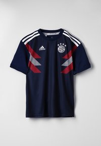 Navy blue sports jersey featuring red and white zigzag stripes, Adidas logo, FC Bayern Munich crest, short sleeves, and crew neck design.