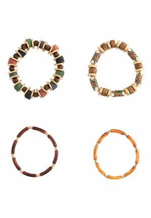 Four circular bracelets: top left with colorful wooden pieces and gold accents, top right features patterned beads, bottom left in dark wood, bottom right in amber tones.