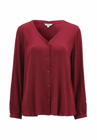 Blusa bordeaux a maniche lunghe con scollo a V, chiusura con bottoni e tessuto testa di moro. Presenta una vestibilità comoda e un delicato dettaglio plissé.