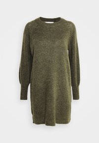 Neuletakki oliivinvihreänä, pyöreällä pääntiellä, pitkillä puhvimaisilla hihoilla ja väljä istuvuus, jossa resorit hihansuissa ja helmassa.