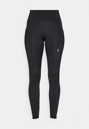 Black full-length leggings made of stretchy material, featuring a high waist, side pockets, and a small logo on the left thigh.