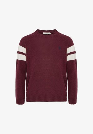 Maglione bordeaux in maglia con strisce bianche sulle maniche, scollo a girocollo, orlo a coste e piccolo dettaglio logo sul petto. Texture morbida.