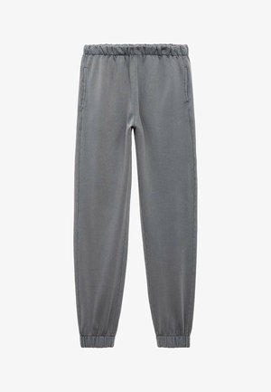 Grå jogger-bukser med elastisk talje, sidelommer og elastiske cuffs, præsenteret på en hvid baggrund.